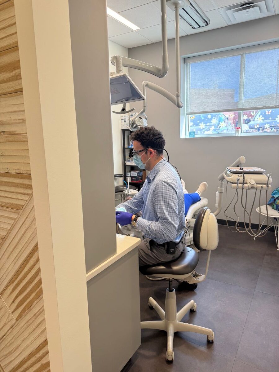 Dr. Bright treating a patient