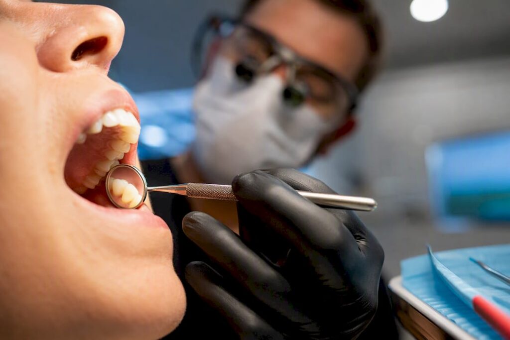 Dentist checking a temporary crown